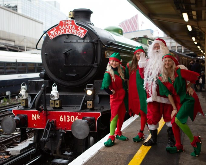 Holiday on Luxury Christmas Train - Comprehensive Guide 2 Santa Claus with elves and luxury christmas train