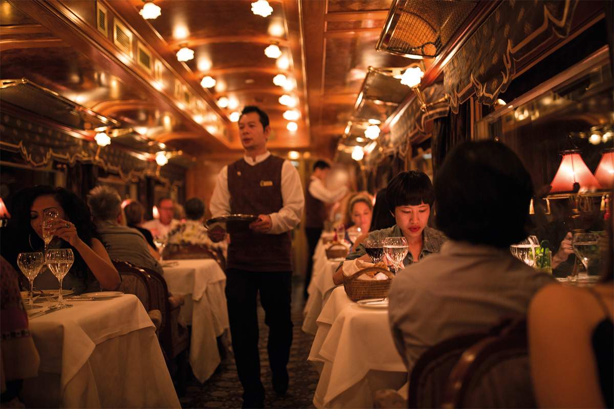 Holiday on Luxury Christmas Train - Comprehensive Guide 4 The-Eastern-Oriental-Express-train luxury winter train trips serving dinner