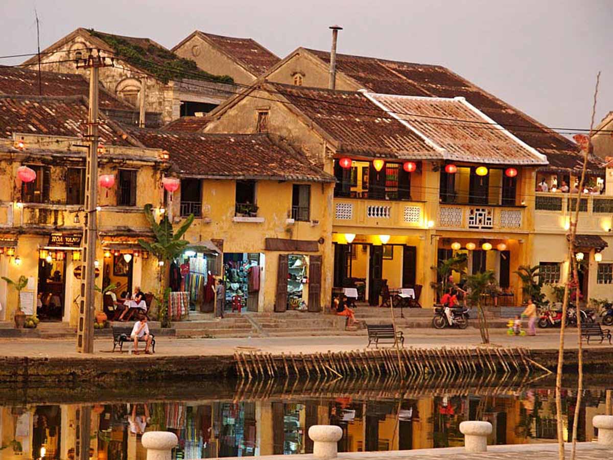 Indochine Style: Exploring the Timeless Elegance 6  Vietnam-Hoi-An-riverfront-view