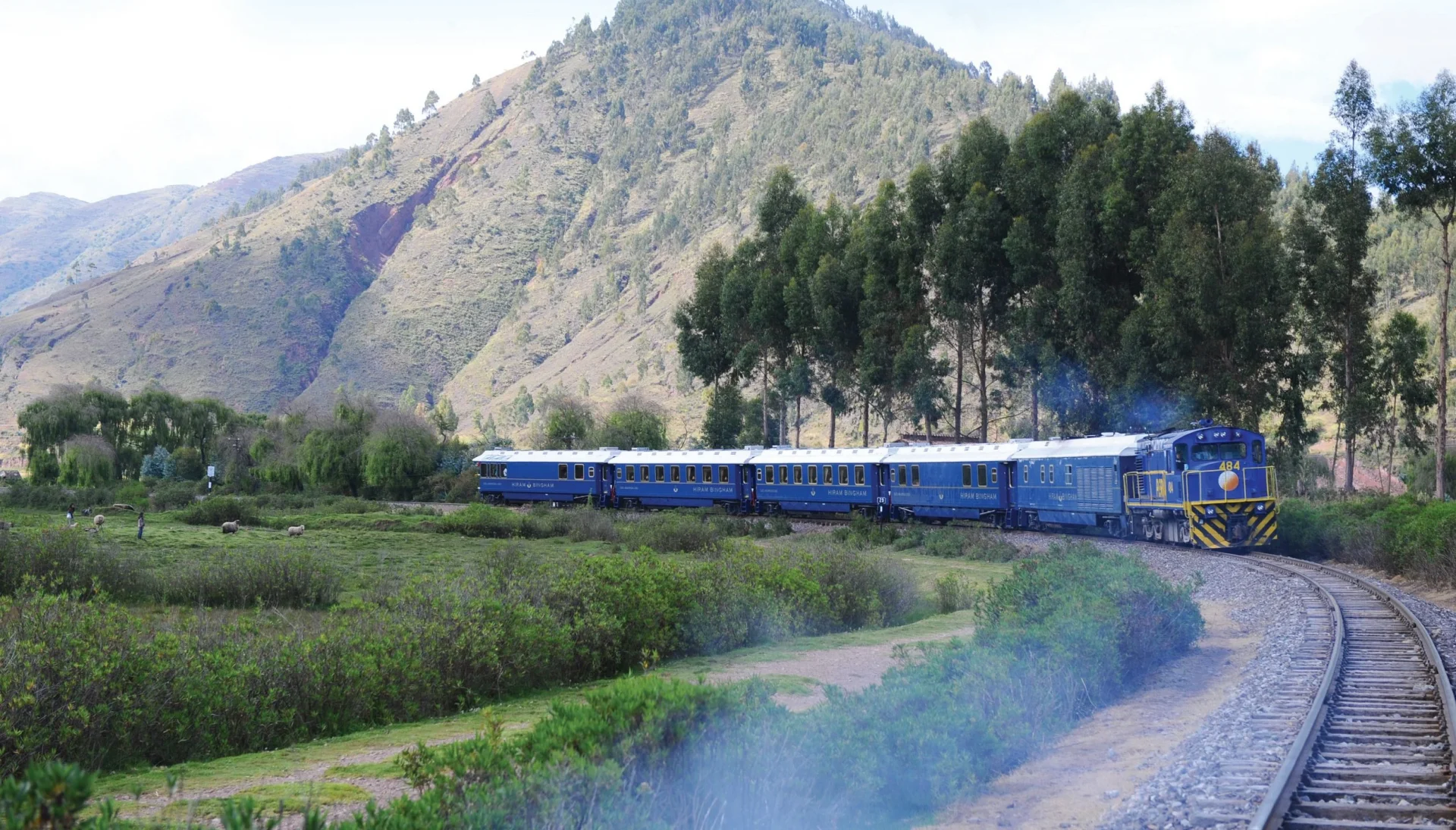 The World's Most Scenic Train Journeys 11 the-hiram-bingham-train-in-peru-through-mountain