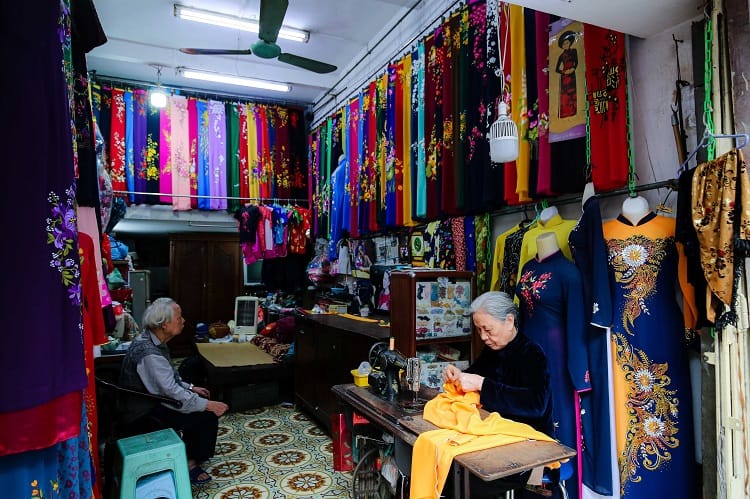 woman tailoring ao dai ladies tailor shops hanoi old quarter prices